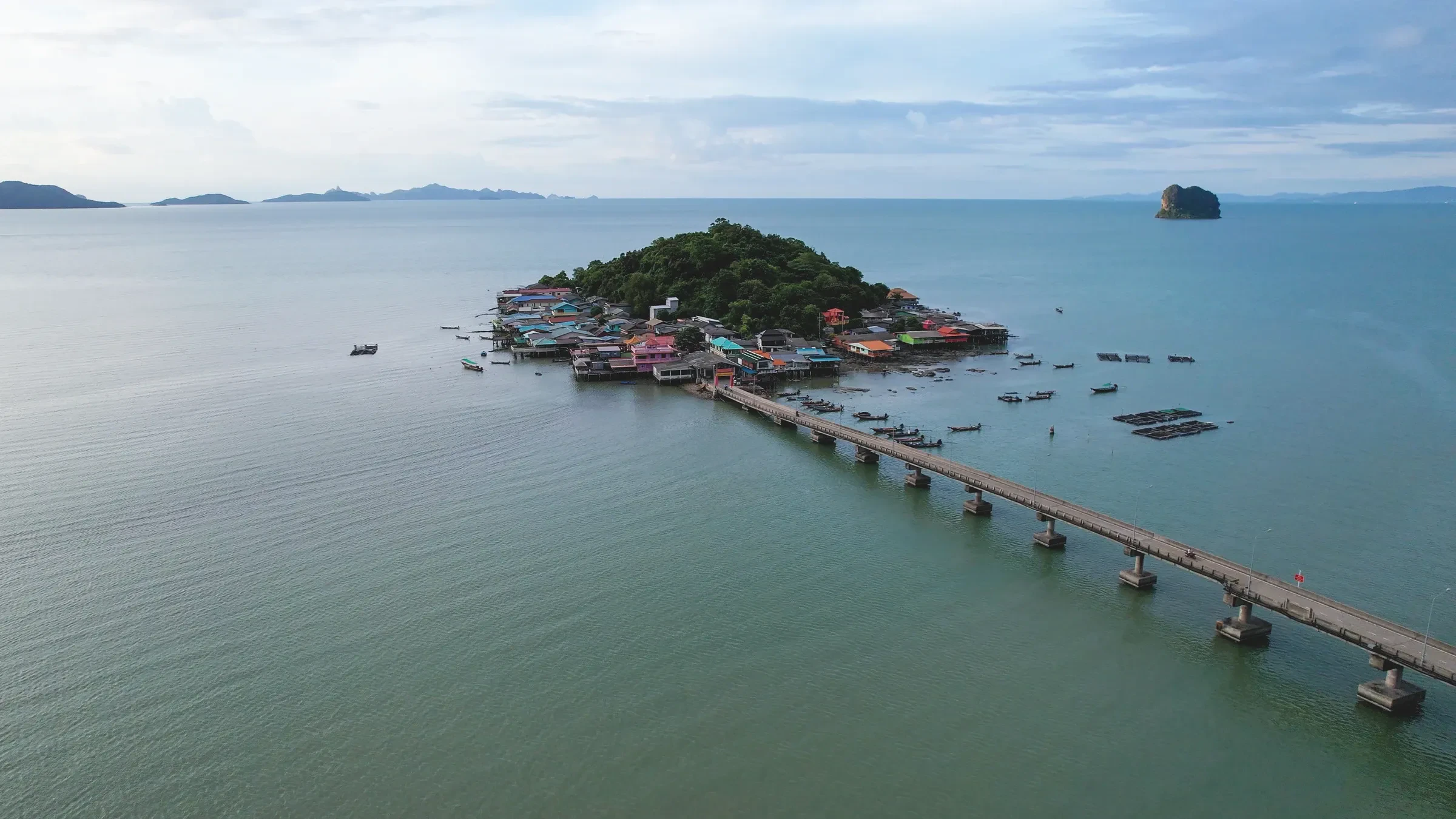 An aerial view of a small island and village in the Gulf of Thailand