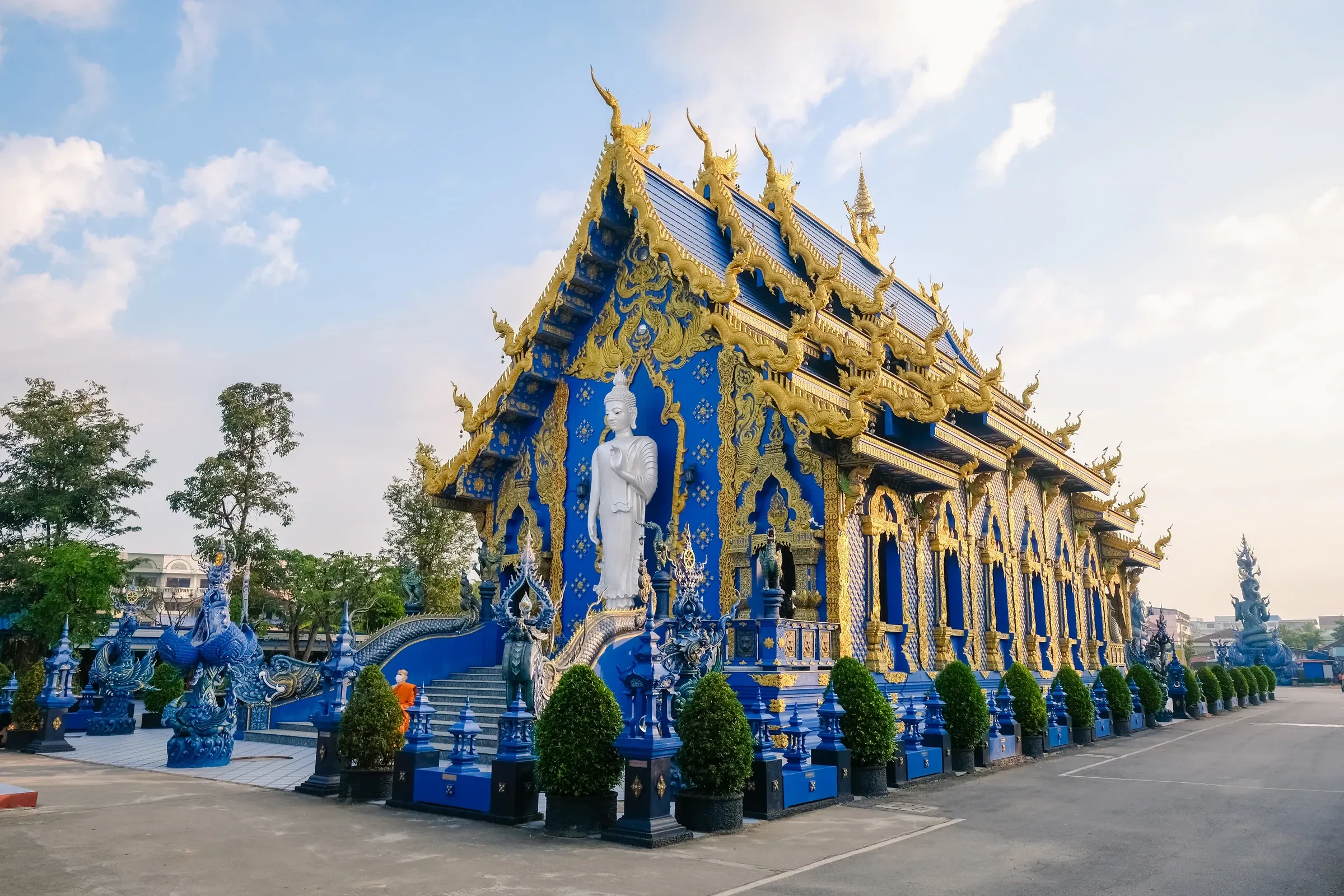 The blue and gold Blue Temple (Wat Rong Suea Ten) in Chiang Rai
