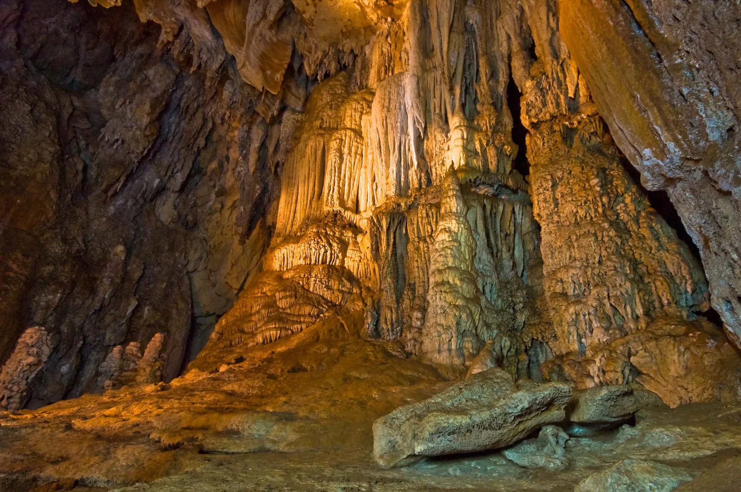 Limestone formations inside a cave by Cheow Lan Lake in Khao Sok National Park