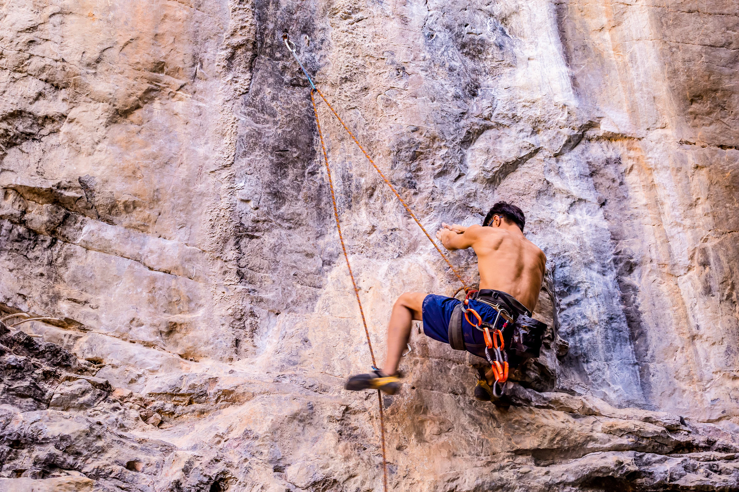 A climber on a limestone wall on Railay