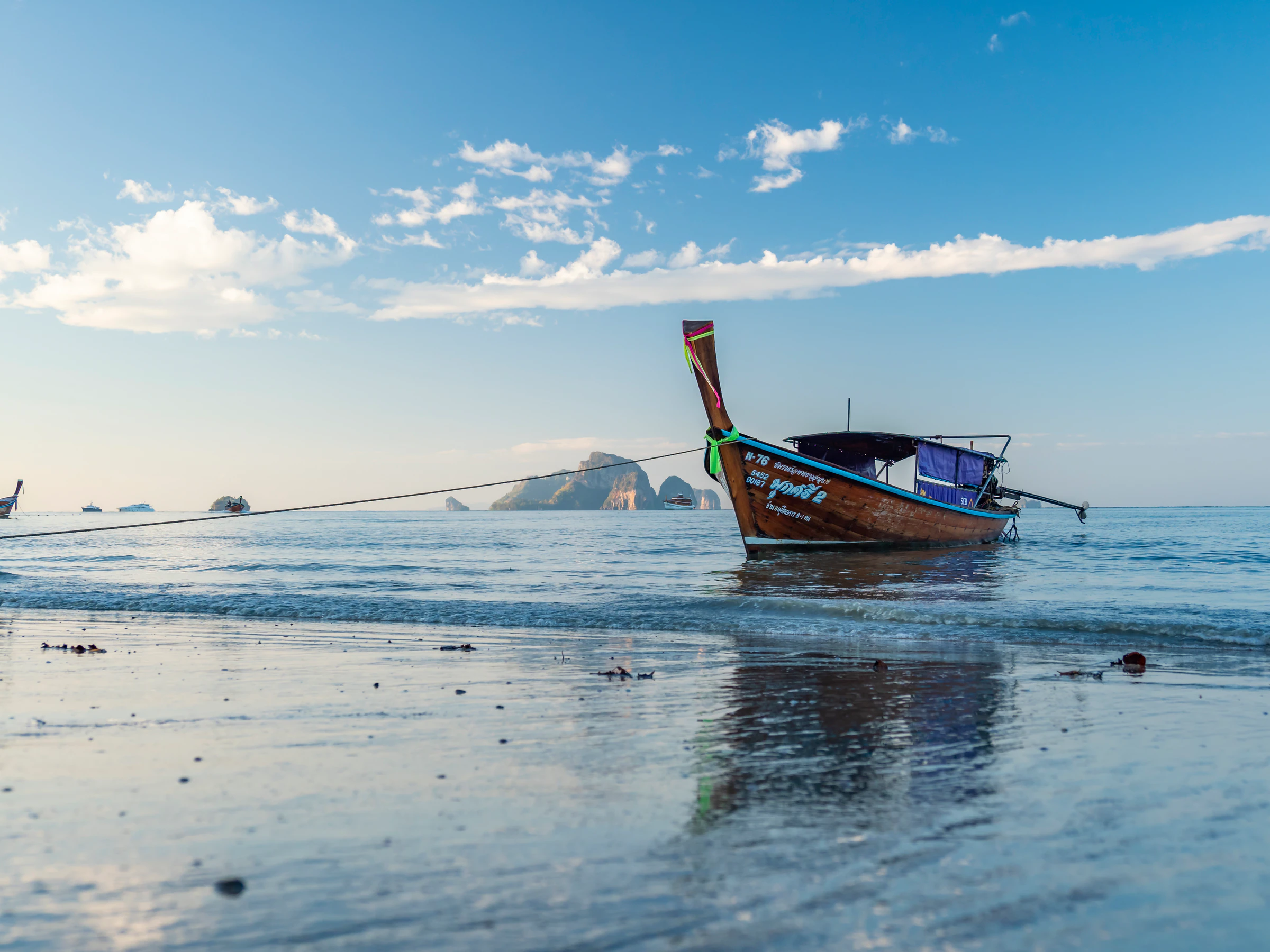 Traditional long tail boat on Ao Nang beach in Krabi