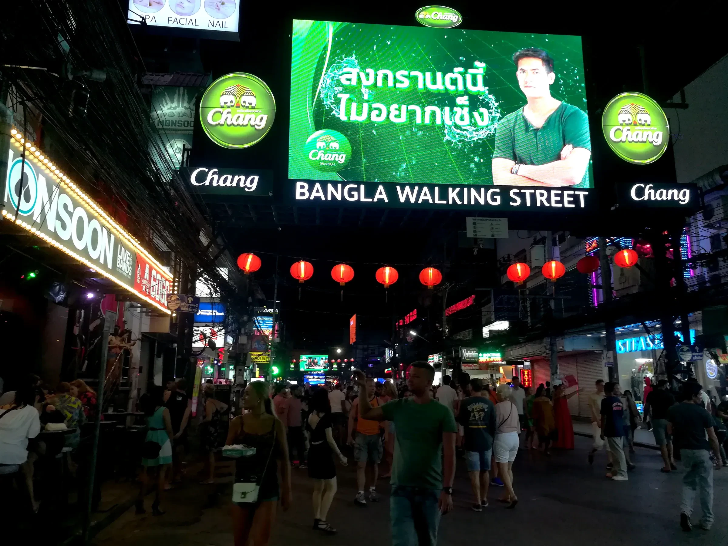 Bangla Road in Patong, Phuket, at night, crowded with people under bar and club signs