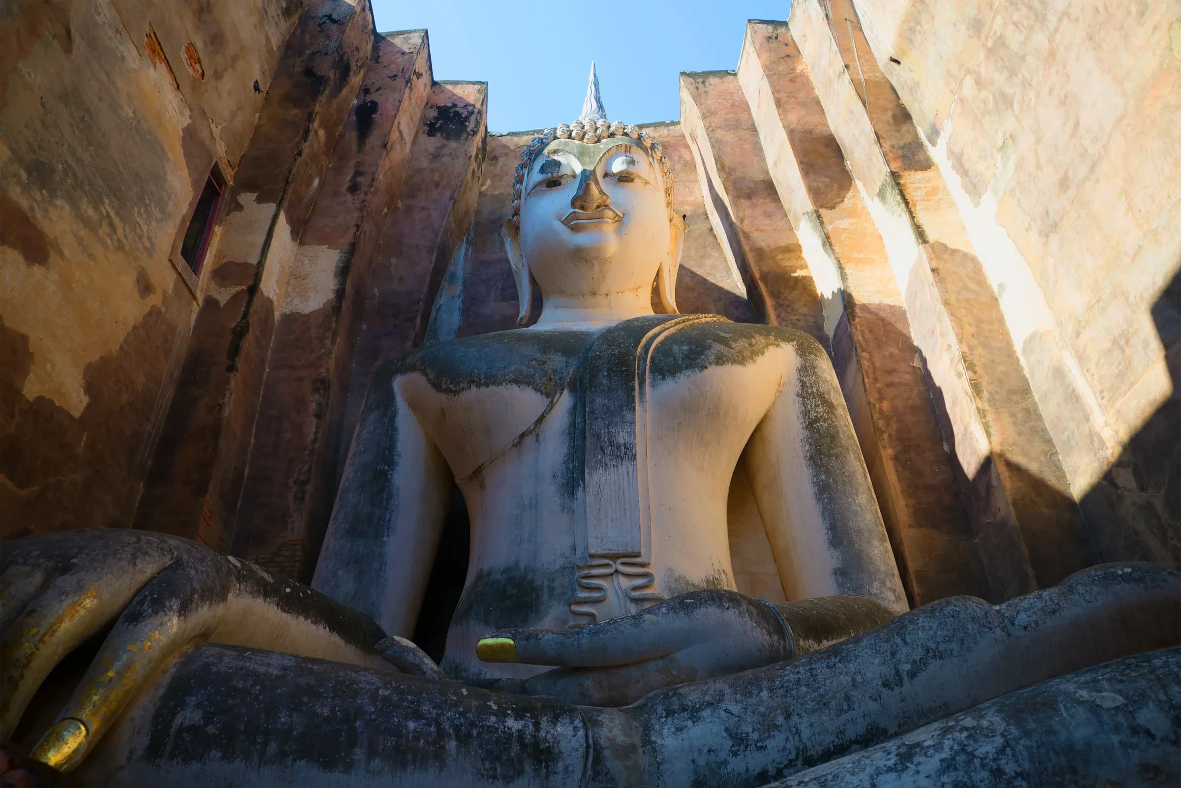 Phra Achana, the giant seated Buddha inside Wat Si Chum's mondop in Sukhothai