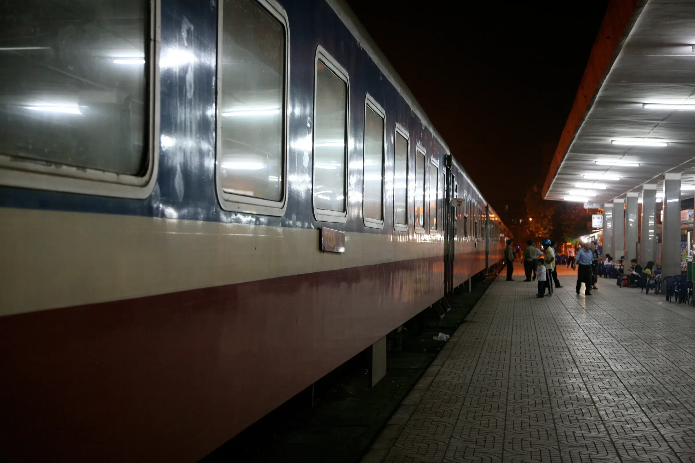 A Vietnam Railways train standing at a platform in Hanoi Railway Station
