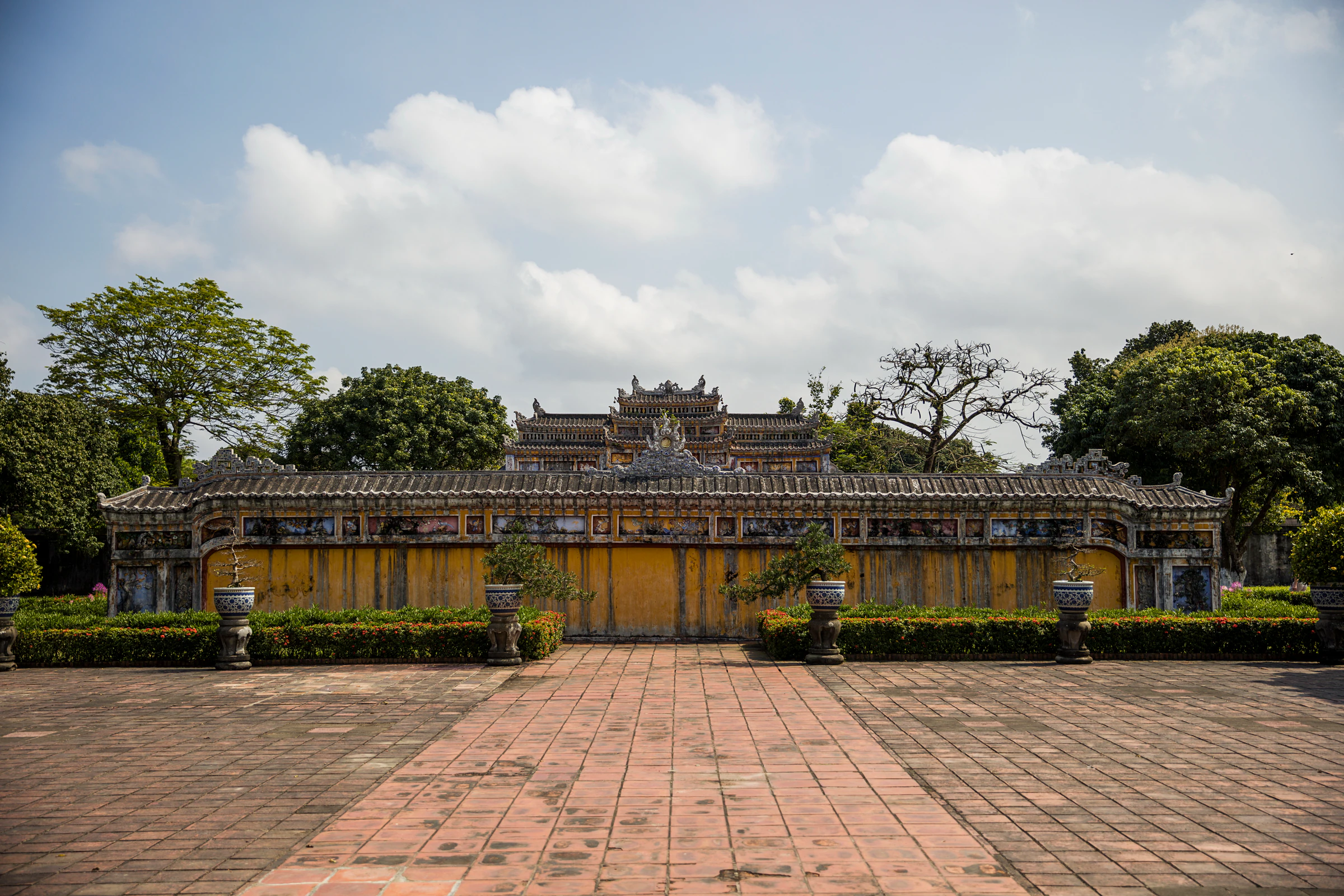 A courtyard inside Hue's royal palace complex, a festival craft-fair setting