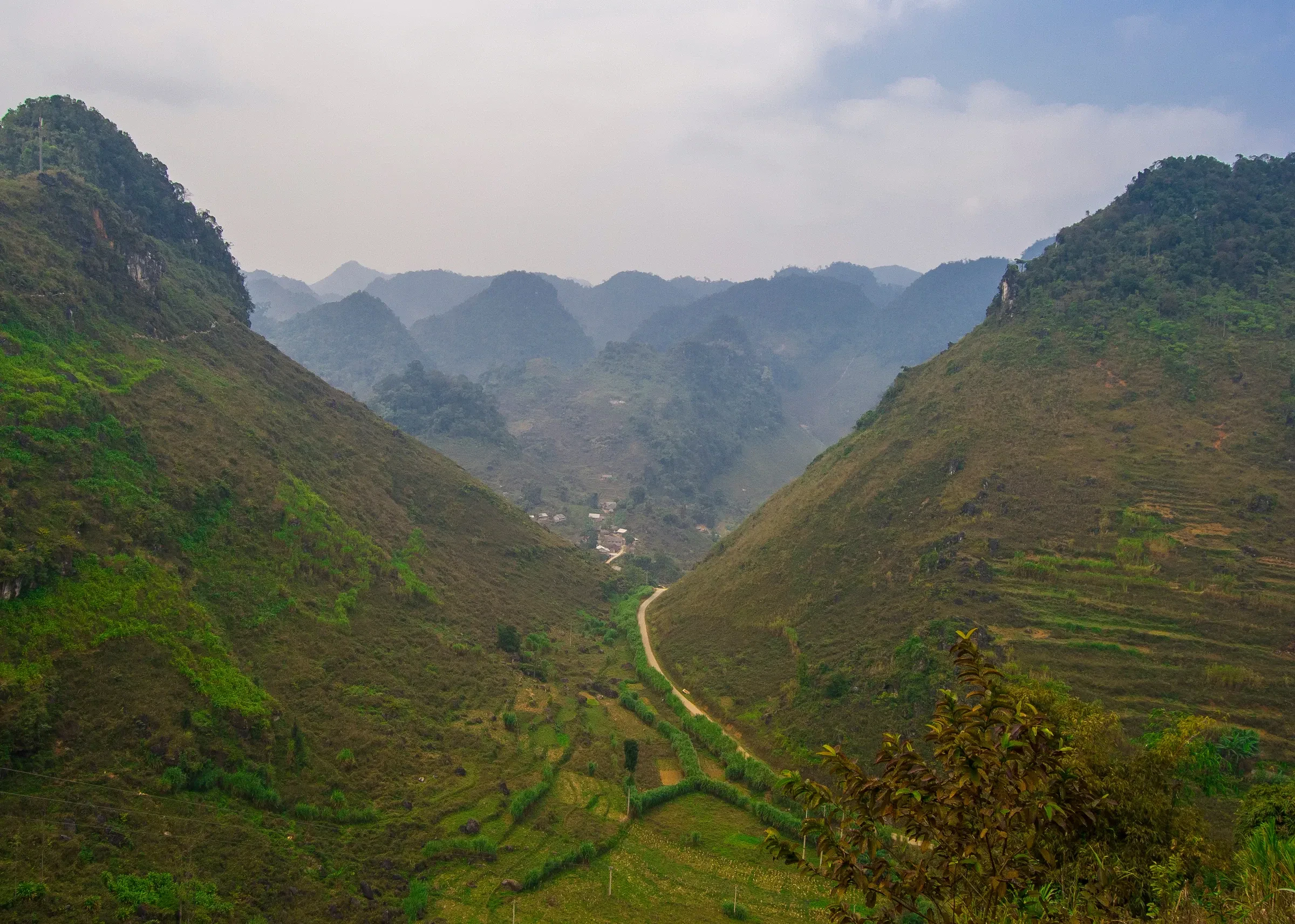 Green terraced hillsides in the mountains of Ha Giang, northern Vietnam