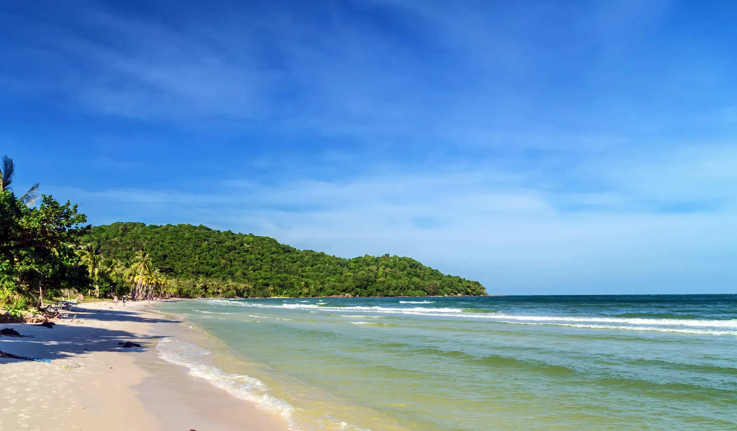 Pale sand and clear shallow water at Bai Sao beach on Phu Quoc
