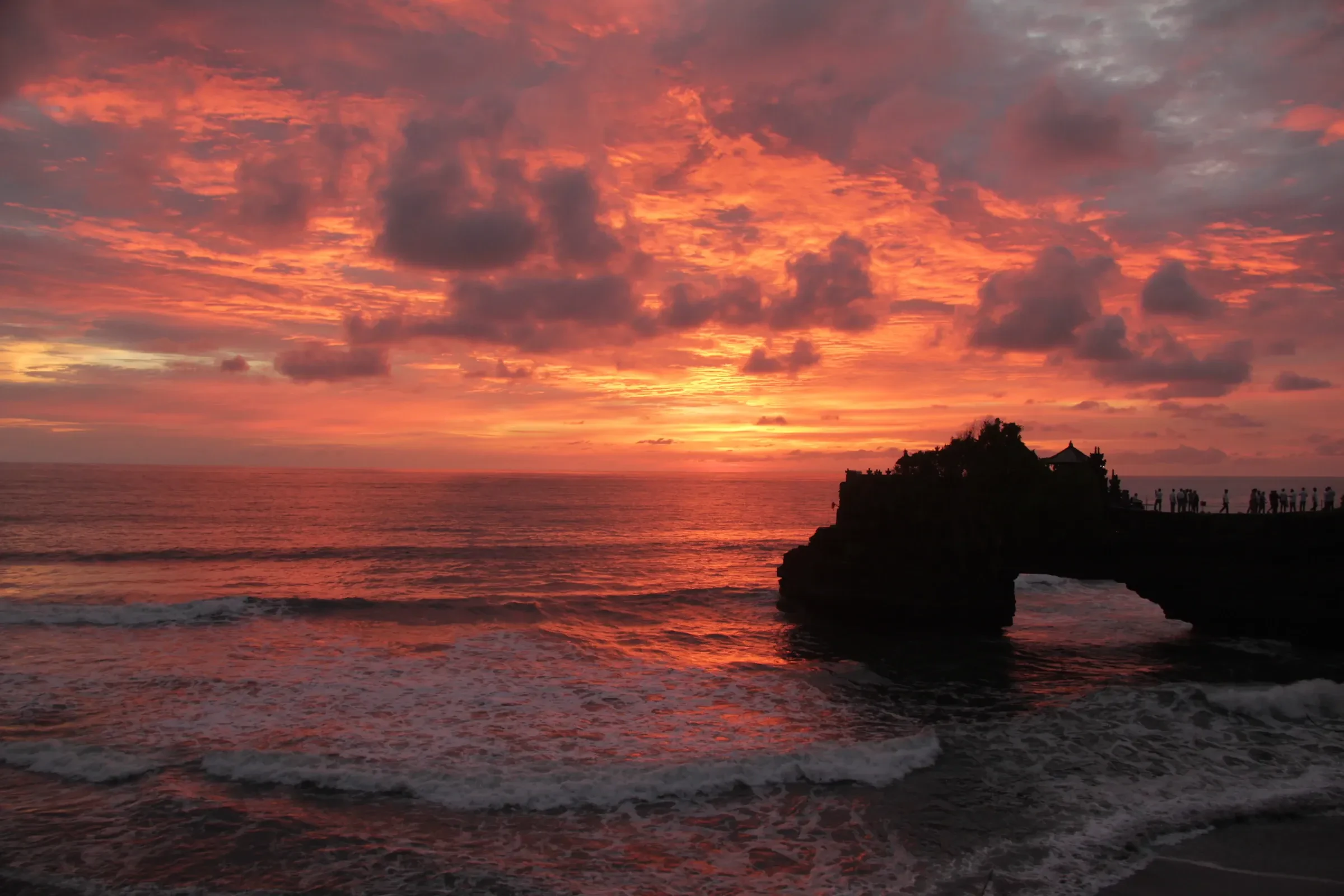 Sunset over the sea at Tanah Lot on Bali's west coast