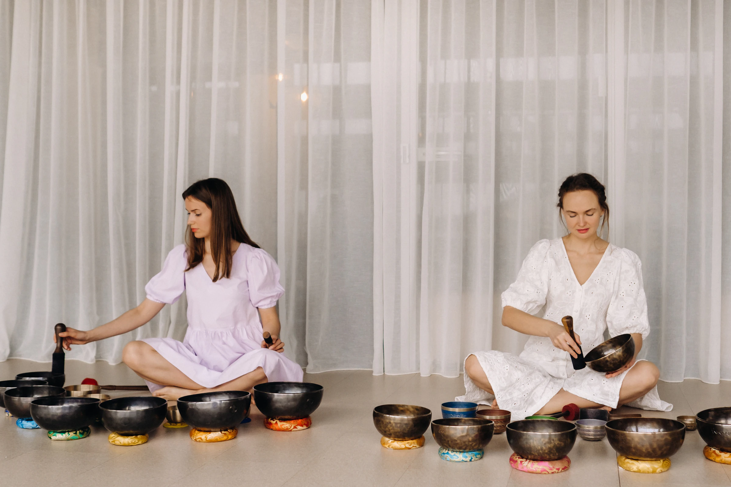 A sound bath session with singing bowls