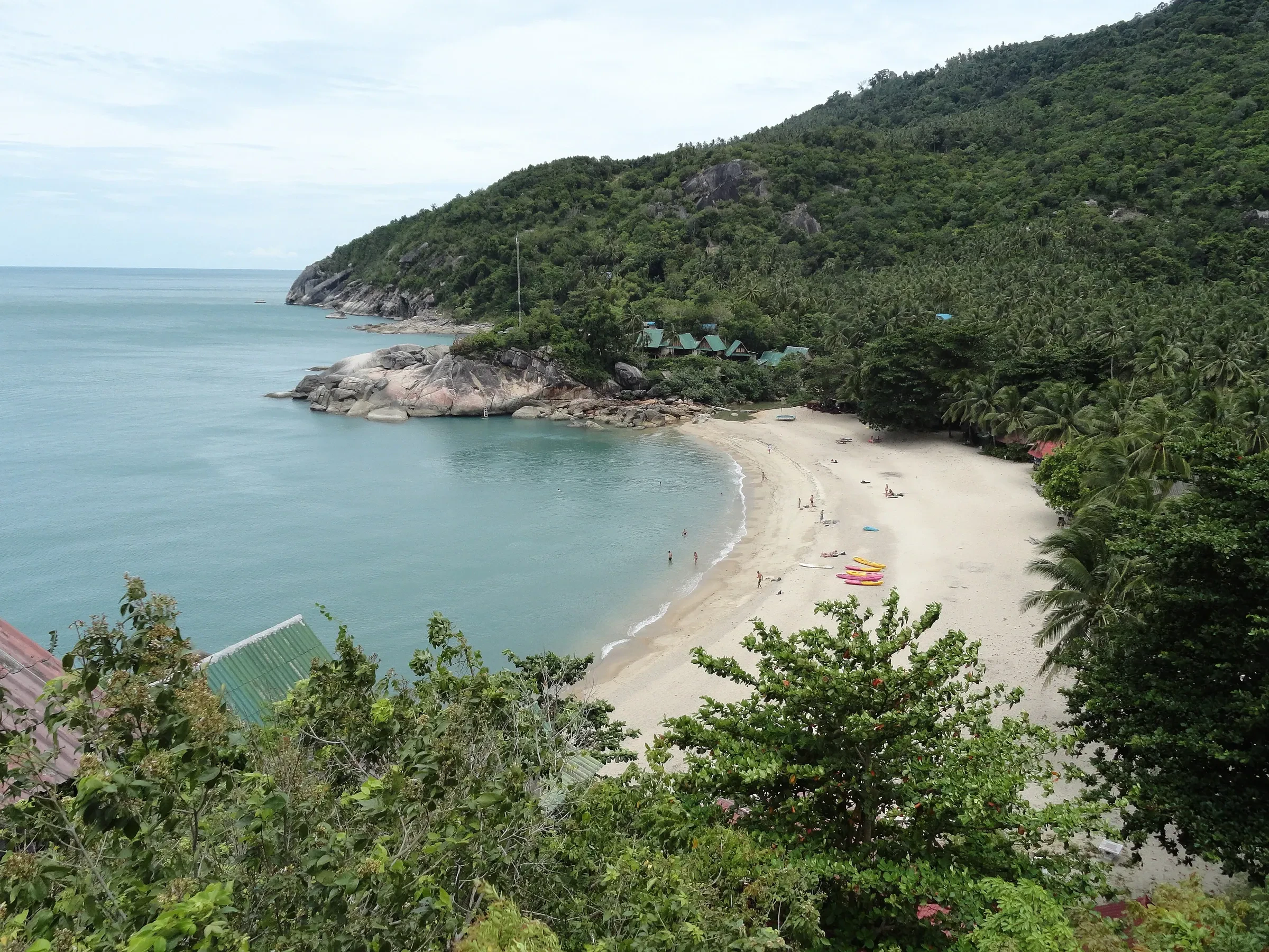 A quiet white-sand cove at Than Sadet Beach on Koh Phangan