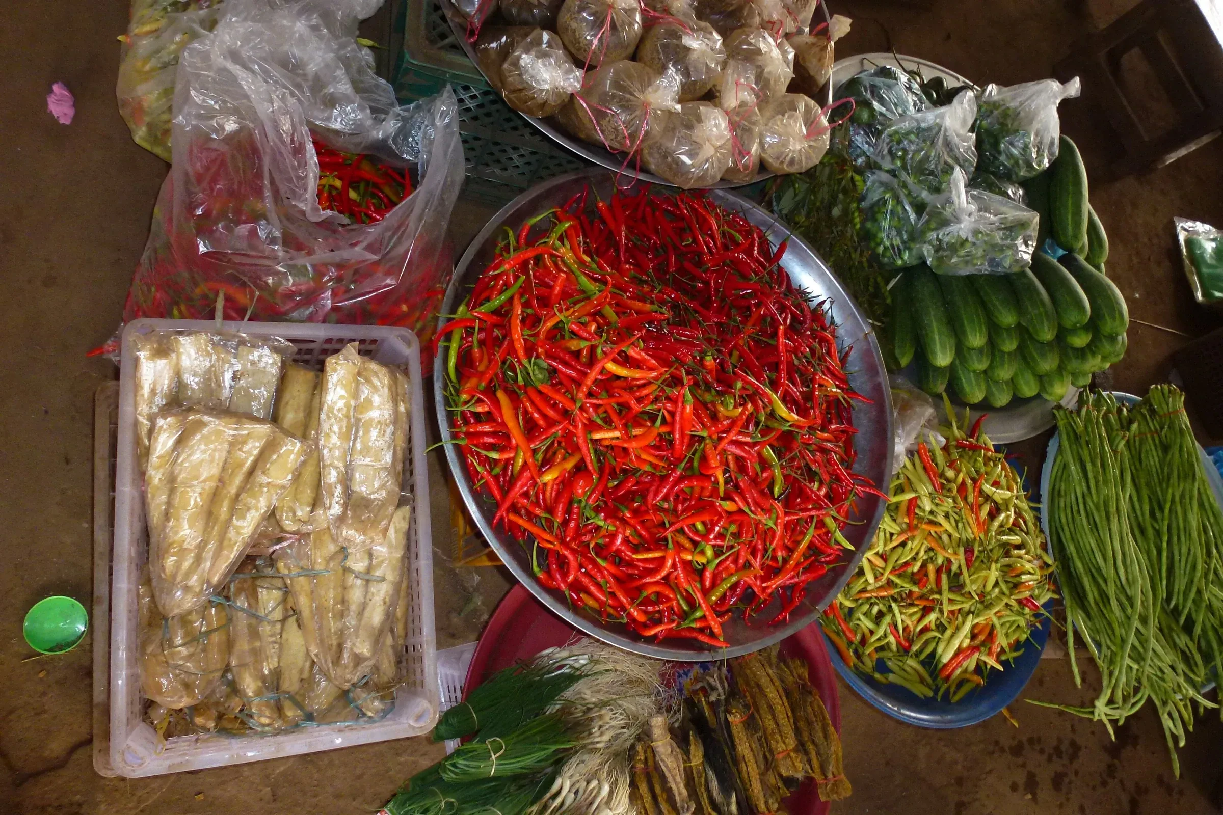 Chillies, beans and vegetables for sale at the market in Paksong