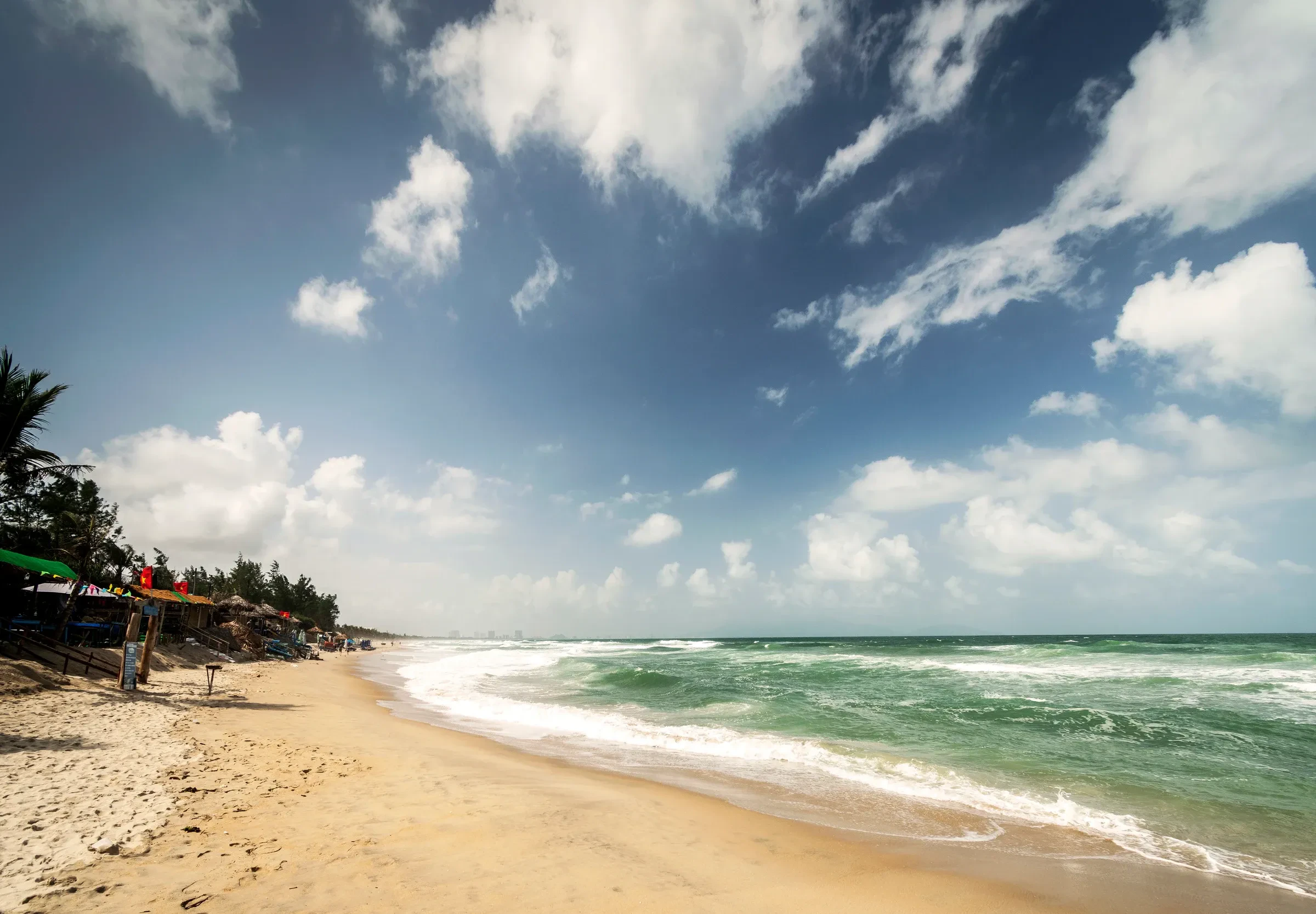 Waves rolling onto An Bang beach near Hoi An