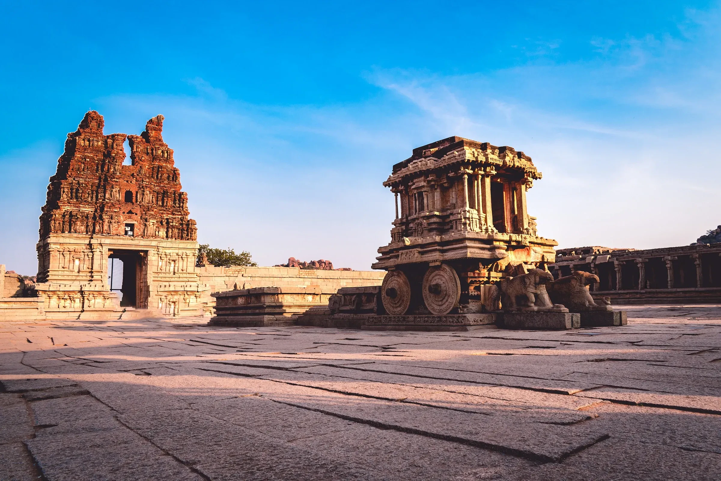 The stone chariot and a gopuram at Vittala Temple, Hampi