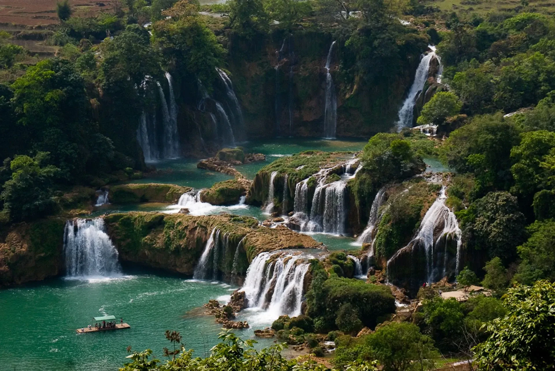 Ban Gioc Waterfall spilling in tiers across the border with China