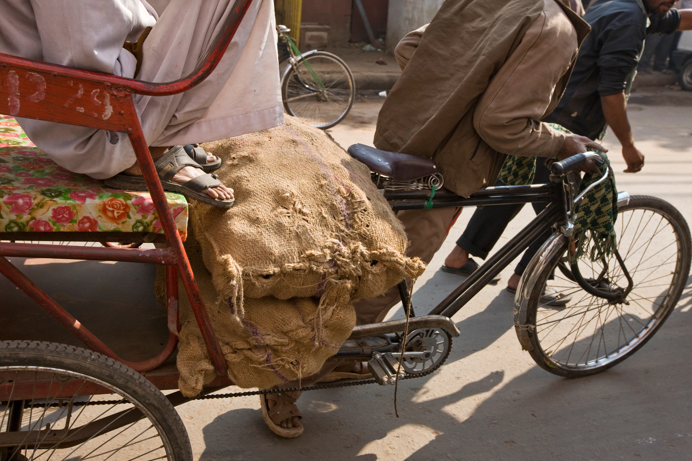 A cycle-rickshaw rider in an Old Delhi lane