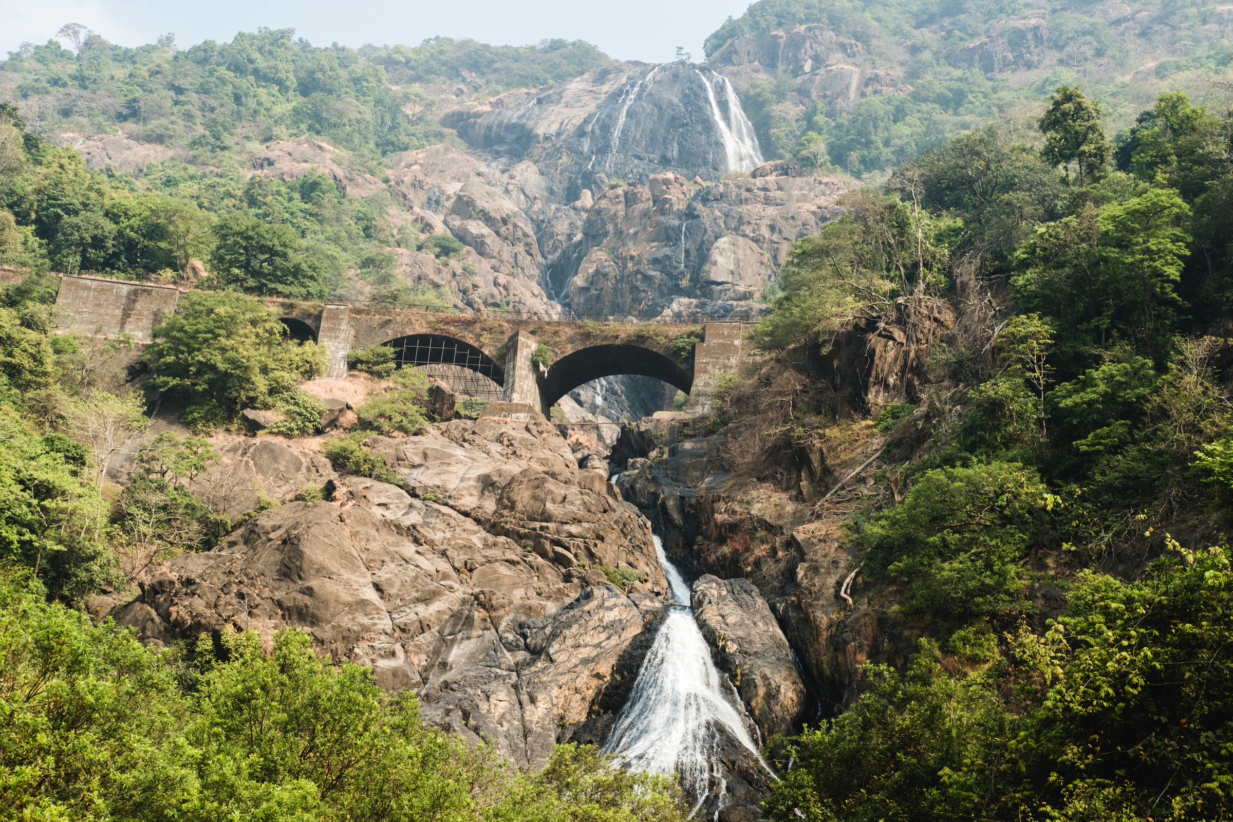 Dudhsagar falls pouring under the railway bridge