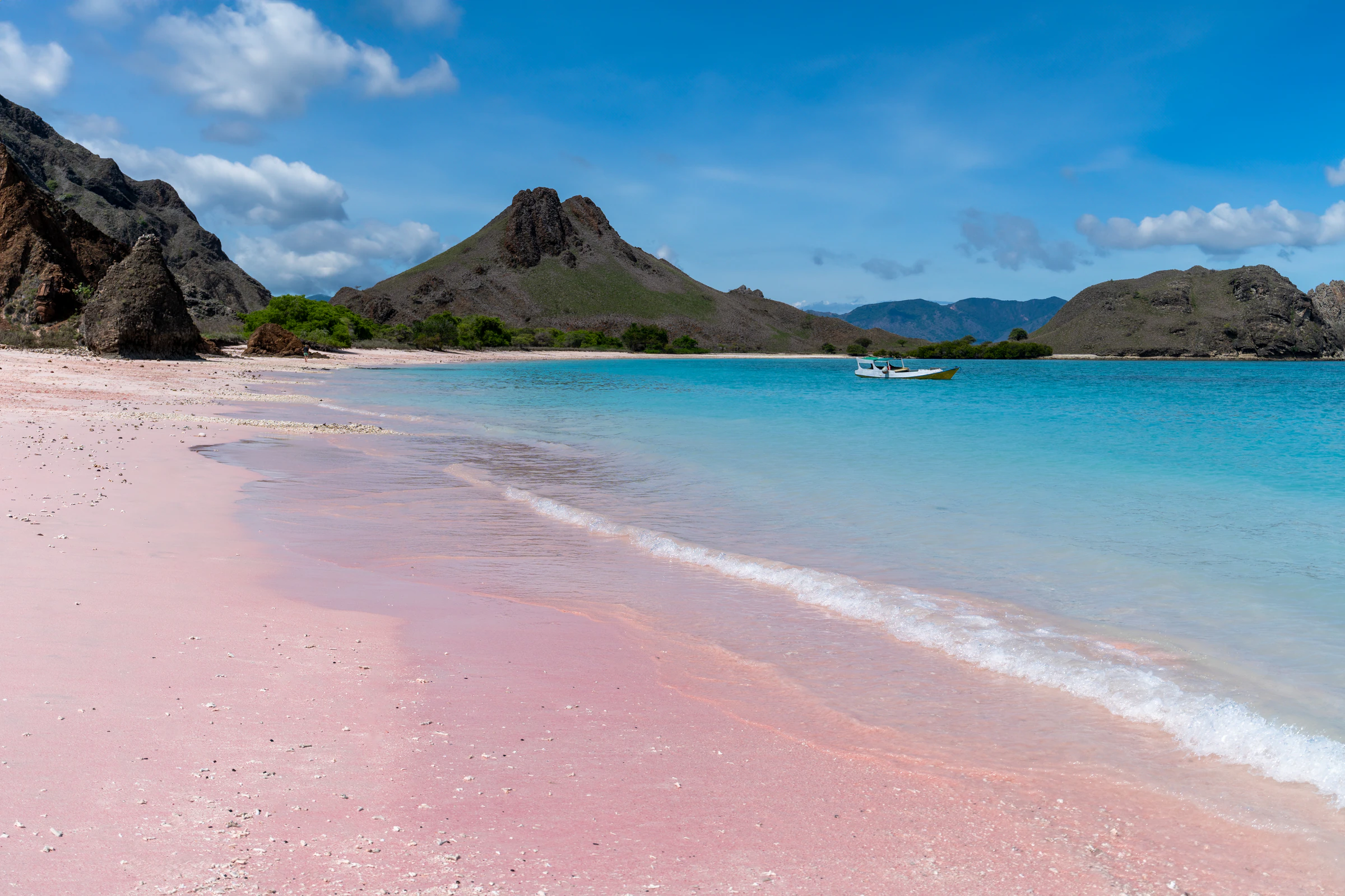 Pink Beach on Komodo Island, with pale pink sand and clear water