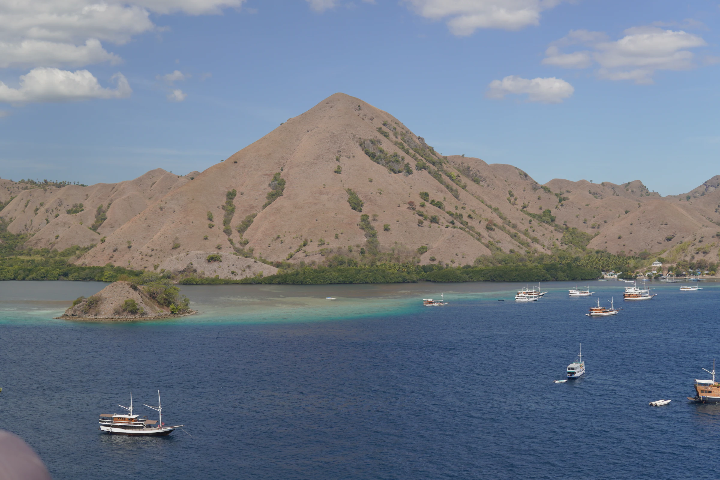 Boats sailing back into Labuan Bajo harbour