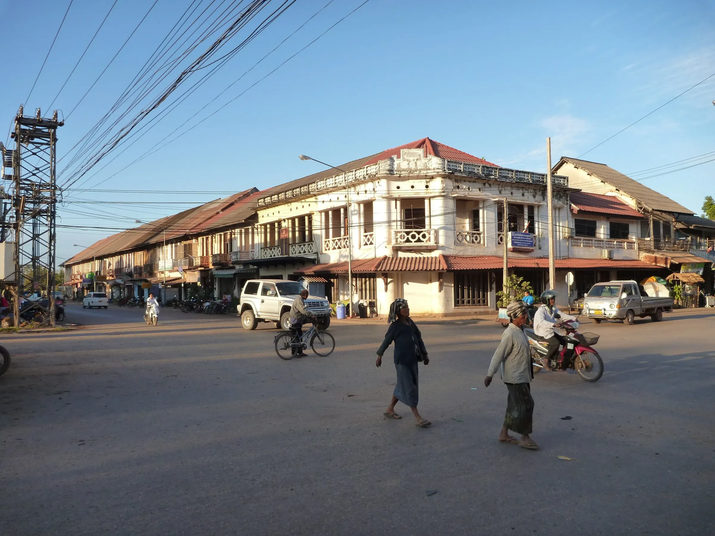 A corner of old shophouses at a crossroads in Thakhek