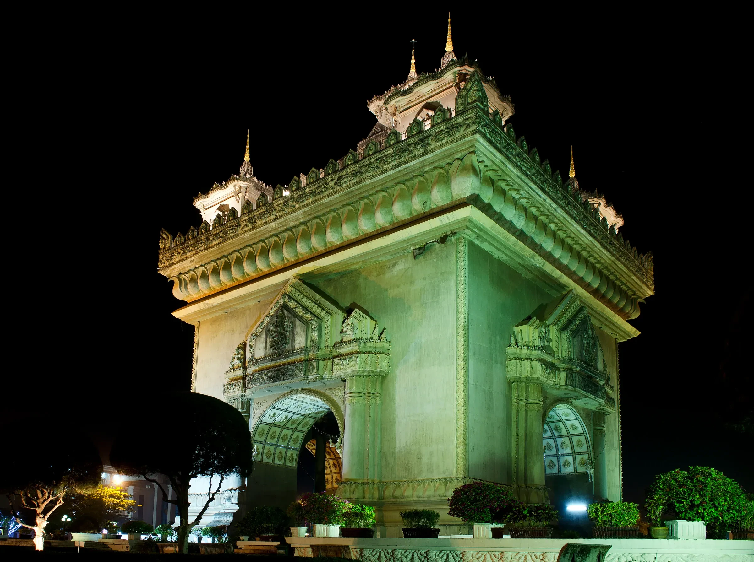 The Patuxai victory gate lit up at night in Vientiane