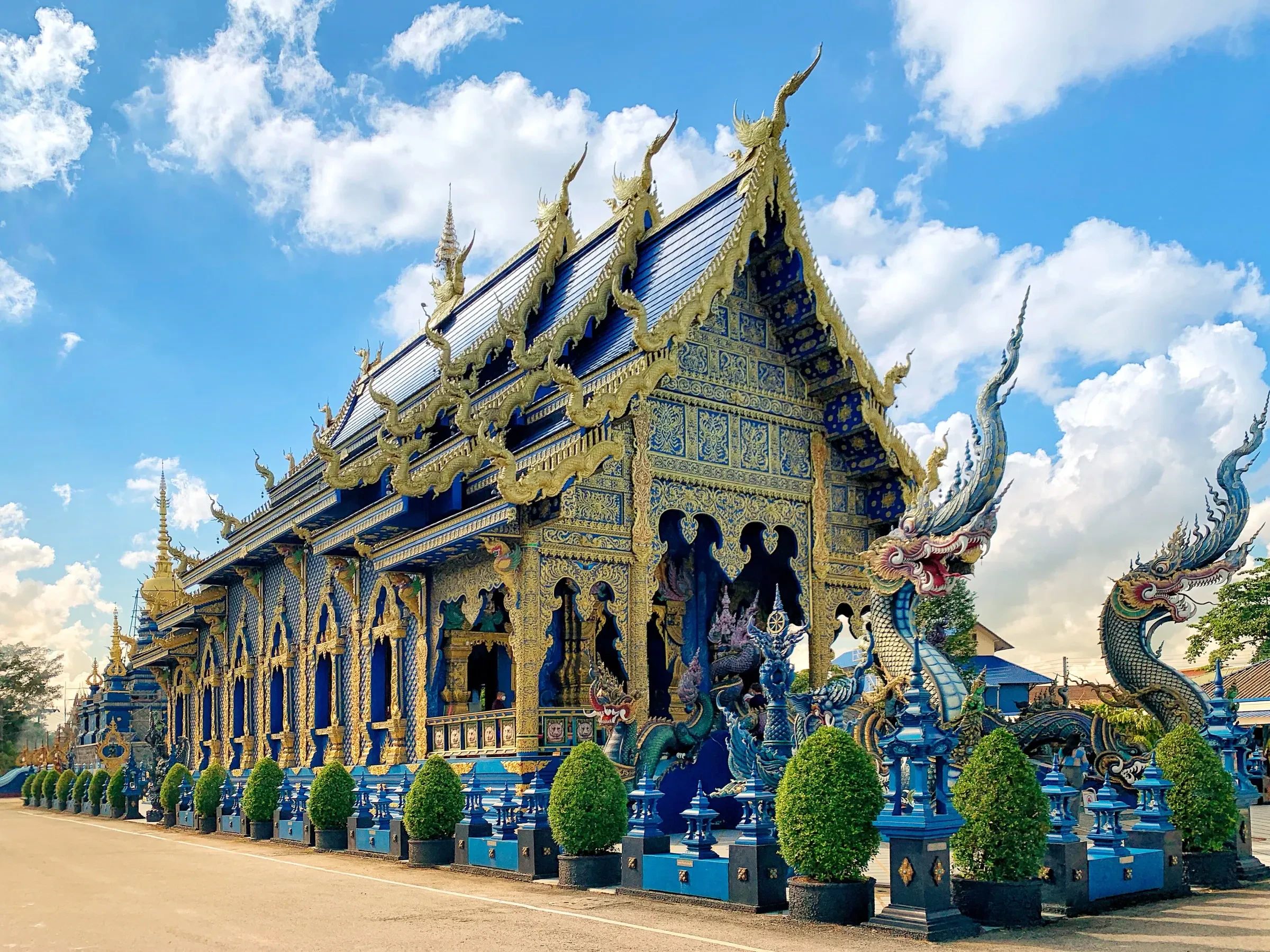 The Blue Temple, Wat Rong Suea Ten, in Chiang Rai under a blue sky