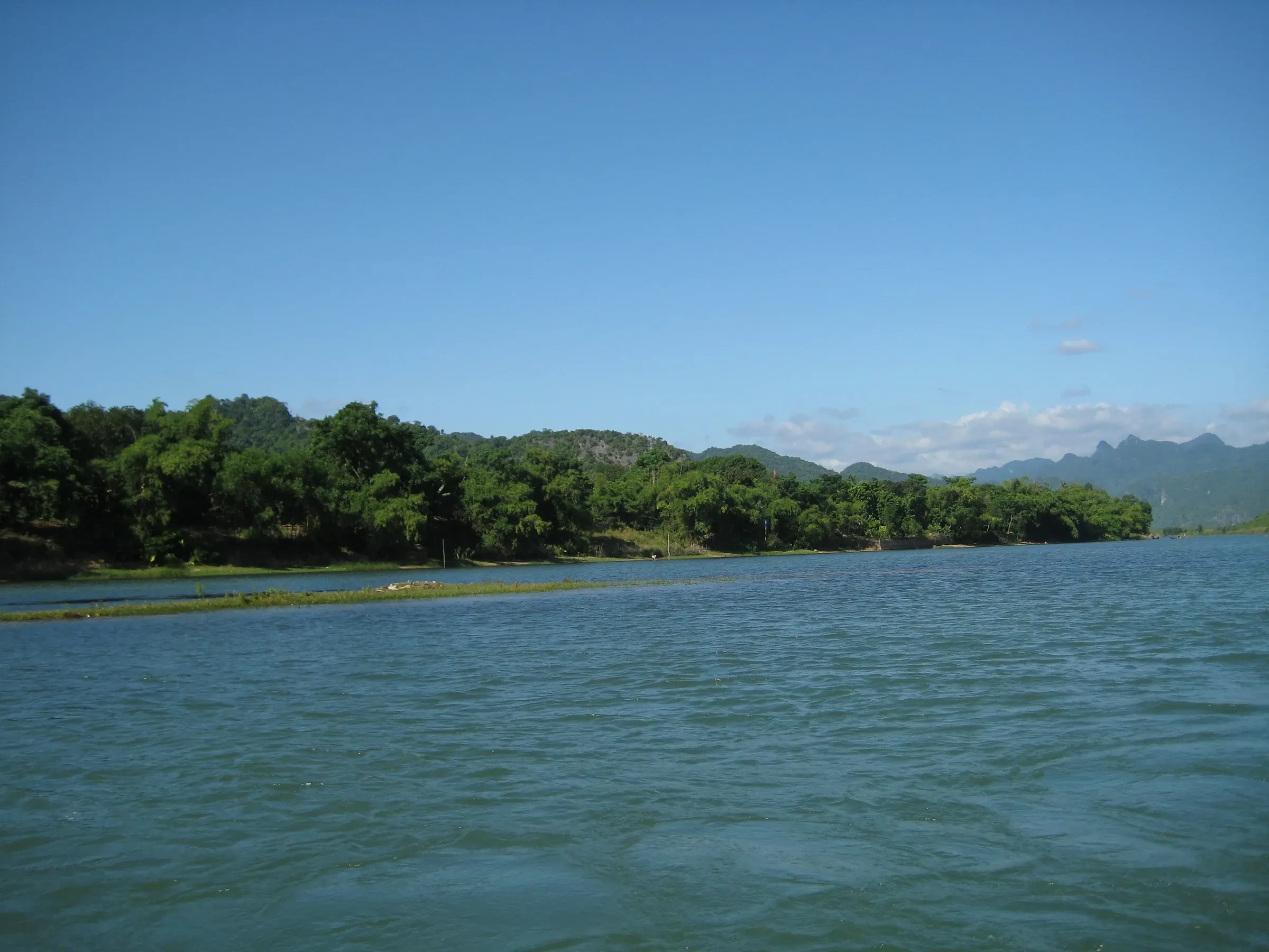 The Son River winding between forested hills in Phong Nha-Ke Bang National Park