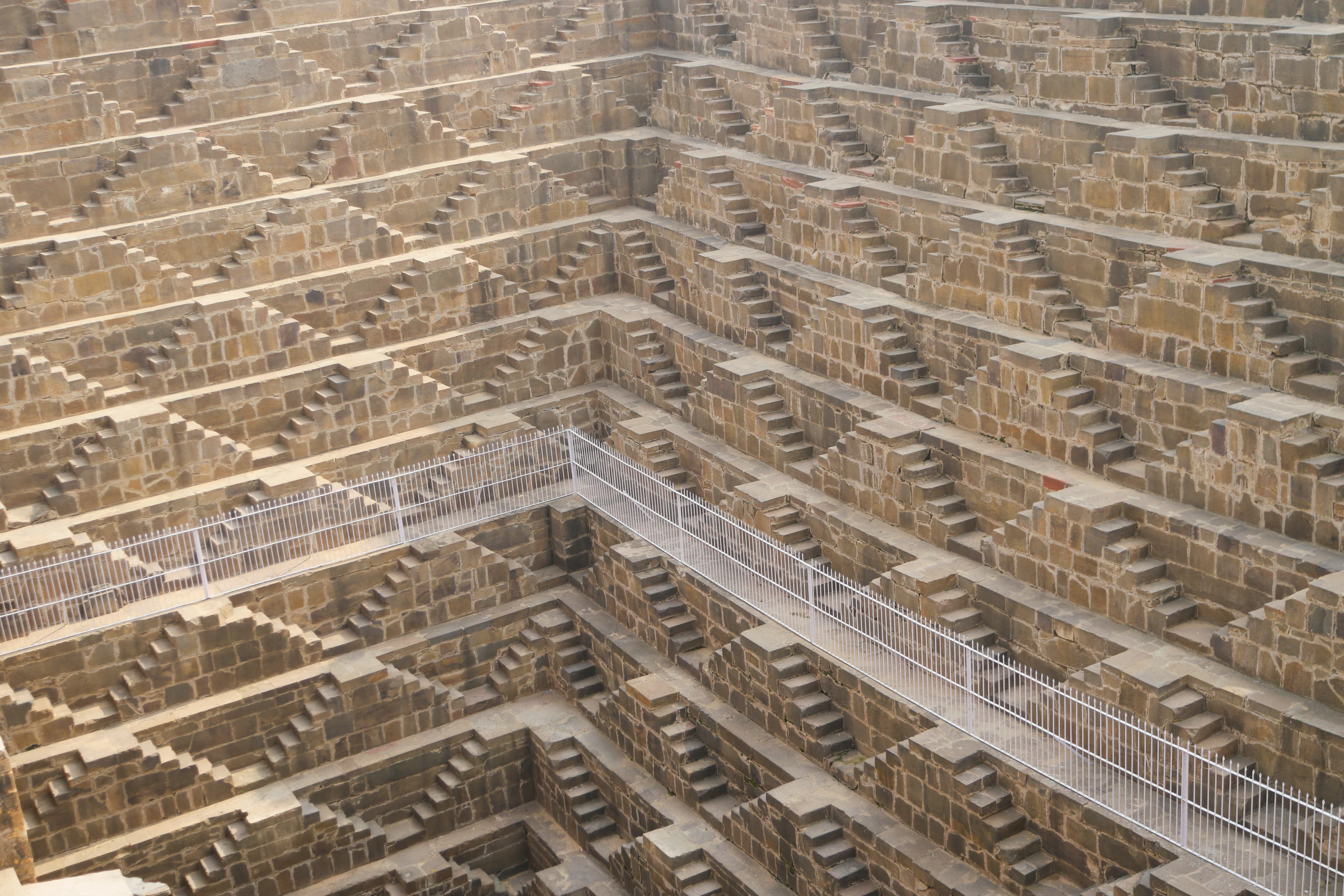 The geometric steps of the Chand Baori stepwell in Abhaneri