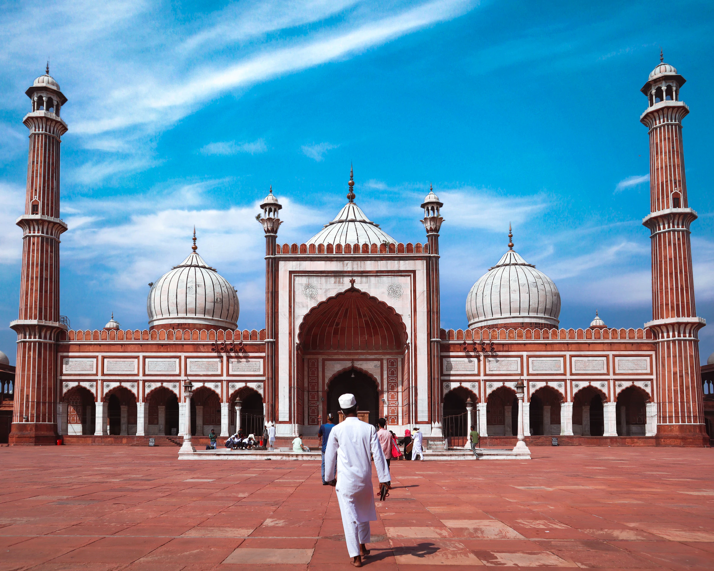 The red sandstone gateway and domes of Jama Masjid in Old Delhi