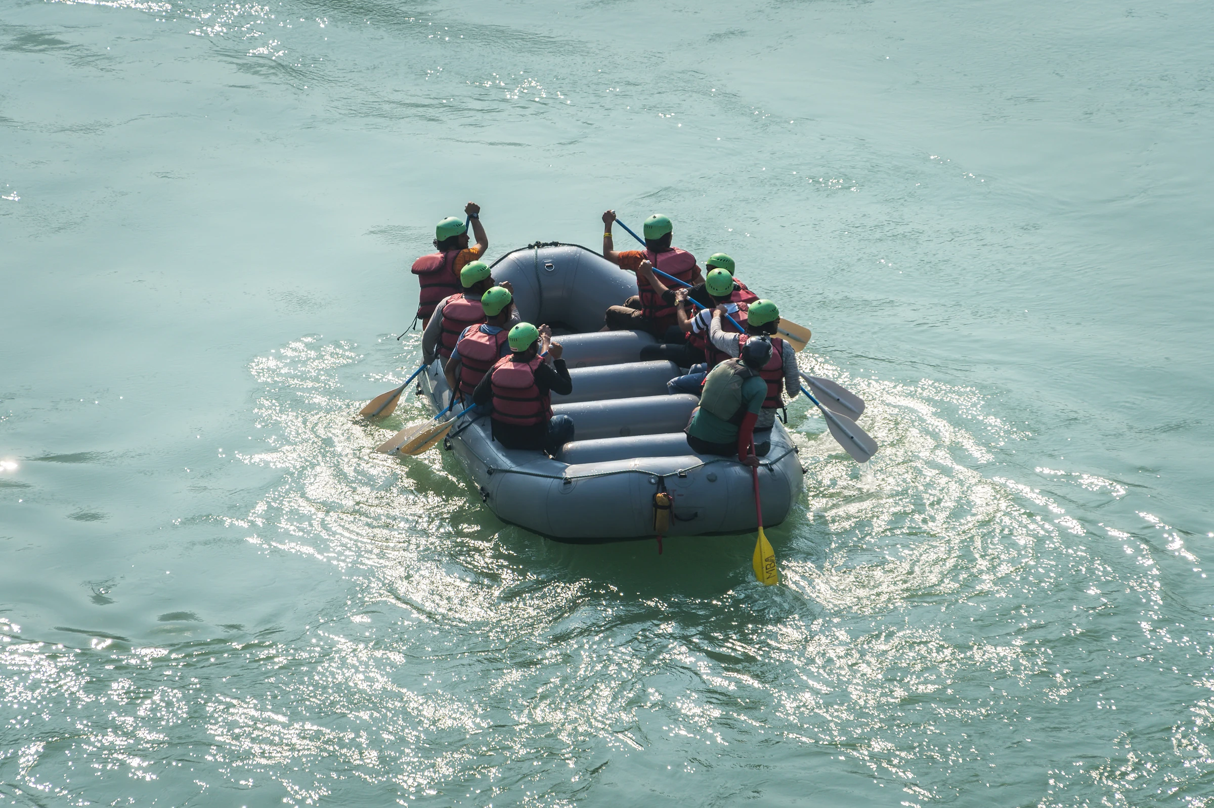 A group whitewater rafting on the Ganges near Rishikesh