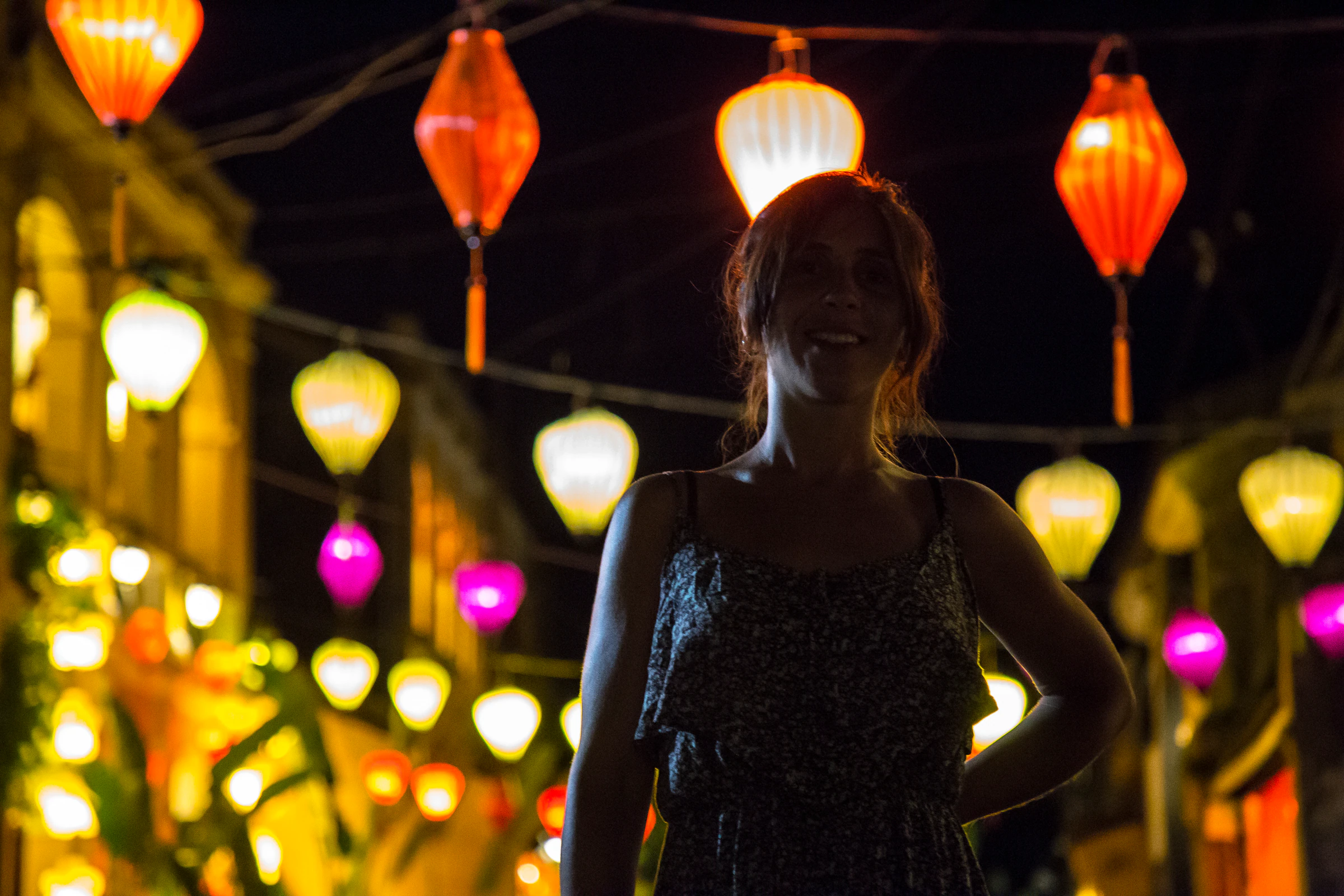 Traditional lanterns lit at night in Hoi An's old town