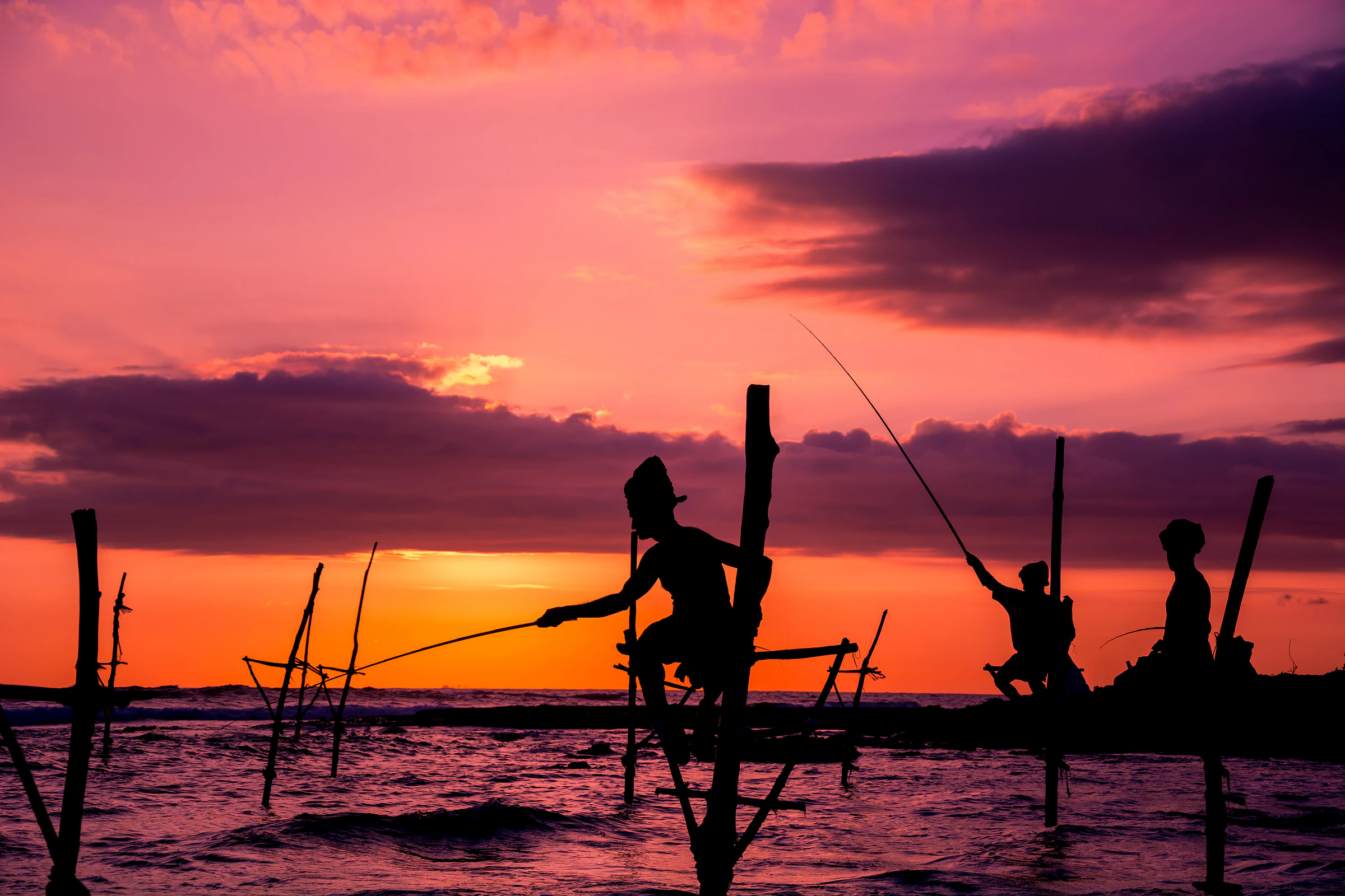 Traditional stilt fishermen at sunset on the south coast