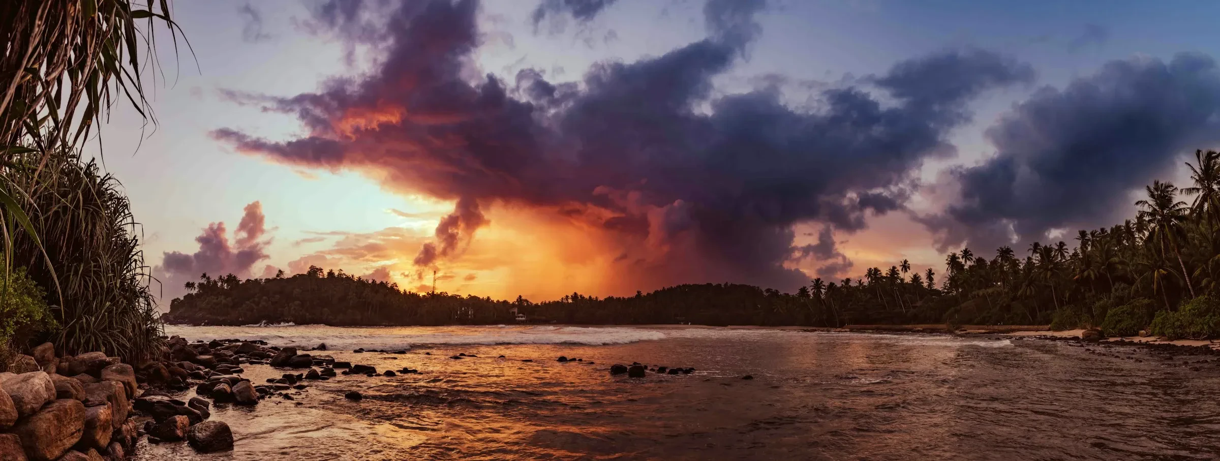 Sunset colours over the bay at Hiriketiya
