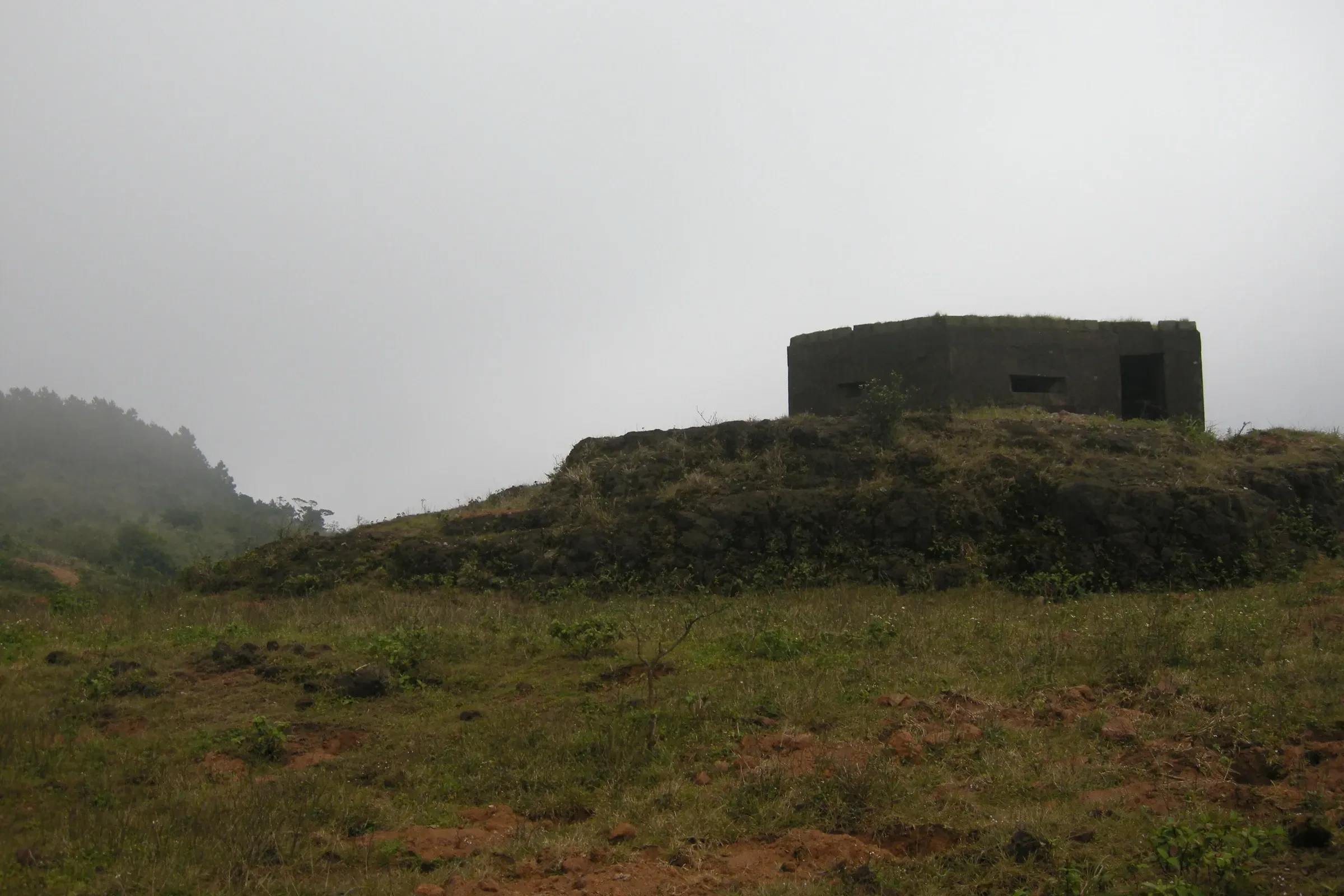An old military bunker on the Hai Van Pass in the mist